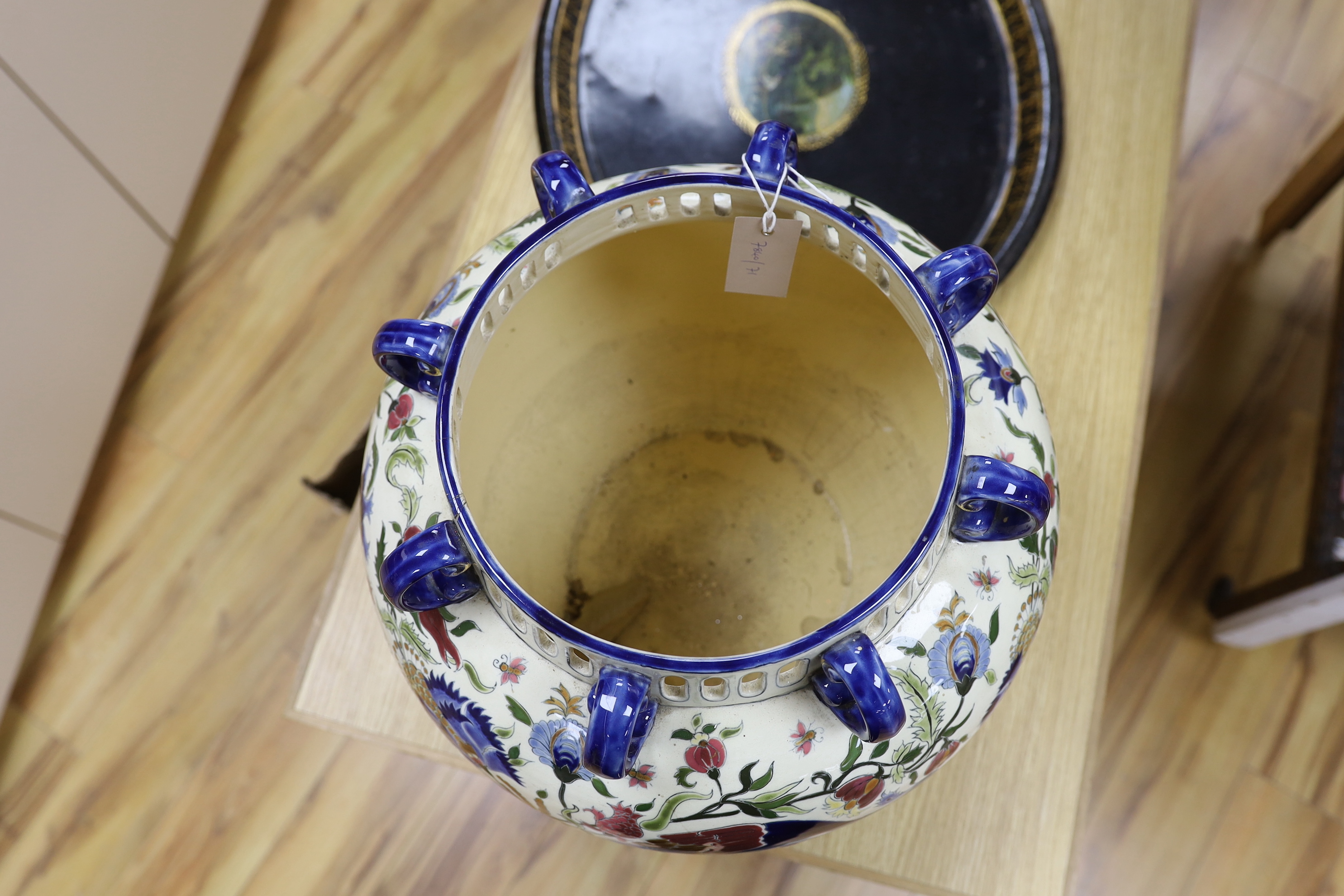 A Zsolnay vase with eight handles, pierced rim and floral decoration with birds, a/f, height 39cm